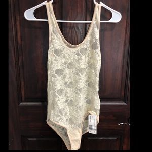 Laced ivory/cream body suit size M